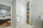 full bathroom attached to bedroom 1